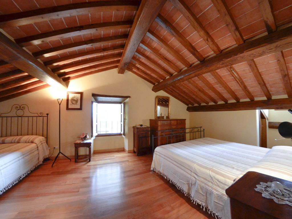 Aparthotel Casa Ambra à Cortone Chambre photo